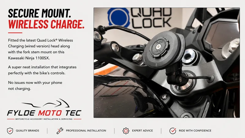 Quad Lock wireless charging mount installed on a Kawasaki Ninja 1100SX